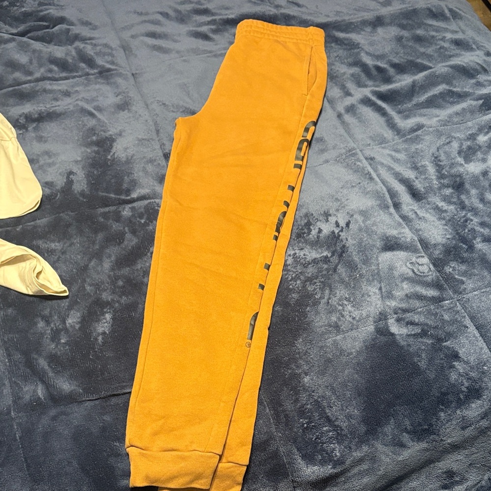 Carhartt Orange Sweatpants with Black Logo